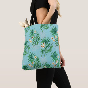 Tropical leaves and flowers tote bag