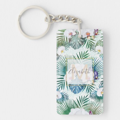 Tropical leaves and orchid flowers design keychain