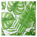 Tropical leaves ceramic tile<br><div class="desc">Watercolor pattern with monstera and palm leaves.</div>