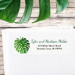 Tropical Leaves Christmas Lights Fun Beach Holiday Label<br><div class="desc">This fun, modern holiday design features a beautiful tropical leaf on the left-hand side, decorated with glowing multicolored lights. On the right-hand side are a customizable name and address, in green and black in popular hand lettered script and sans serif typography, that you can personalize. This label matches perfectly with...</div>