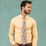 Tropical Leaves Colorful Pattern Teal Orange Blue Neck Tie<br><div class="desc">Nautical Boutique Co.'s colorful tropical leaves pattern tie is great for summer events,  weddings,  any fun summer occasion,  or a winter occasion with a summer or Hawaiian theme! #Tropical #GiftsForHim #BeachWedding</div>