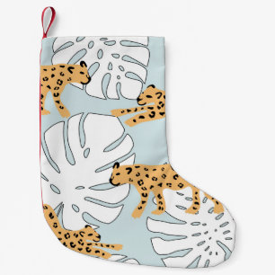 Tropical leopard animal and monstera palm leaves,e small christmas stocking