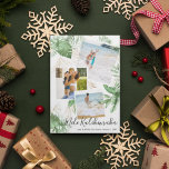 Tropical Mele Kalikimaka Christmas Photo Collage Holiday Card<br><div class="desc">Send family and friends tropical holiday greetings - hawaiian style with these lush botanical watercolor greenery and faux gold Christmas photo collage cards. Featuring three (3) of your favorite photographs cascaded with tropical foliage and faux gold florals, the Hawaiian Christmas greeting 'Mele Kalikimaka' in elegant calligraphy script typography, your name...</div>