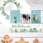 Tropical Mele Kalikimaka Christmas Photo Collage Holiday Card<br><div class="desc">This multi-photo Christmas holiday card is a perfect choice for those who live or are on holiday in the Hawaiian tropics this Christmas season! It features a photo collage of three favorite family photos on the top. Underneath there are your Christmas greetings in a modern whimsical elegant script. Below is...</div>