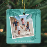 Tropical Mele Kalikimaka Photo Christmas Ceramic Ornament<br><div class="desc">Tropical christmas ornaments featuring a teal background,  2 photos for you to replace with your own,  silhouette beach palm trees,  the hawaiian seasons greetings 'Mele Kalikimaka',  and your family name.</div>