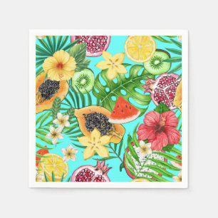 Tropical mix-fruit, flowers and leaves on blue napkins