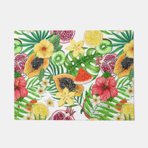 Tropical mix-fruit, flowers and leaves on white doormat