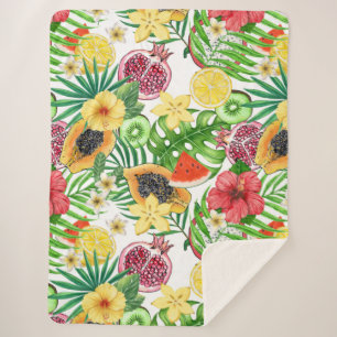 Tropical mix-fruit, flowers and leaves on white sherpa blanket