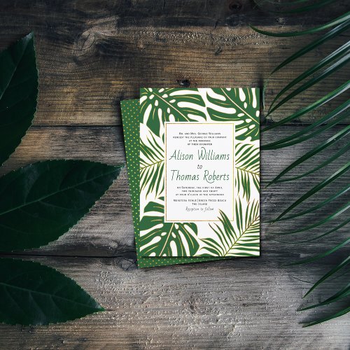 Tropical monstera and palm green leaves wedding invitation