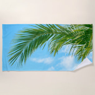 Tropical Palm Leaf Paradise Under Blue Sky Beach Towel