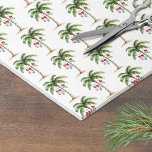 Tropical Palm Tree Beach Christmas Tissue Paper<br><div class="desc">Celebrate the season with this festive wrapping paper featuring a repeating pattern of a watercolor palm tree wrapped in colorful Christmas lights. Three holiday stockings hang playfully from the fronds, with soft beach sand at the base, creating a warm and tropical holiday look. This fun coastal design is perfect for...</div>