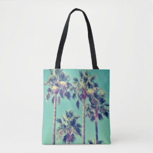 Tropical Palm Trees against a Teal Sky Photo Tote Bag