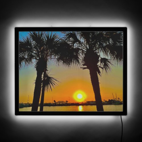 tropical palm trees and sunset LED sign