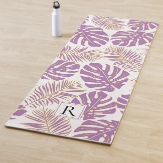 Tropical purple and gold leaves and monogram yoga mat