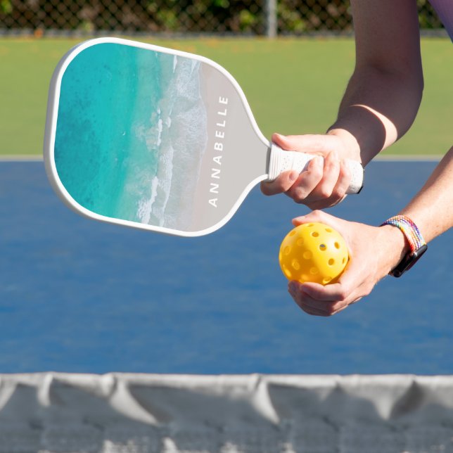 tropical sand beach ocean hot tummy modern pickleball paddle (Insitu)