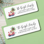 Tropical Santa Christmas Return Address Label<br><div class="desc">Tropical Santa Christmas Return Address label. This festive return address label features a relaxed Santa Claus lounging in a pink flamingo floaty, surrounded by tropical holiday details like a palm tree decorated with ornaments, gentle ocean waves, and a small island in the background. The charming watercolor artwork is placed on...</div>