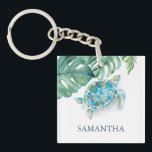 Tropical Sea Turtle Personalized Keychain<br><div class="desc">This inexpensive tropical key chain template showcases your name in navy blue, complemented by a top border featuring original watercolor sea turtle and monstera palm leaves by Victoria Grigaliunas. Perfect for adding a coastal touch to your keys, this custom key chain makes an ideal beach-themed housewarming gift or a thoughtful...</div>