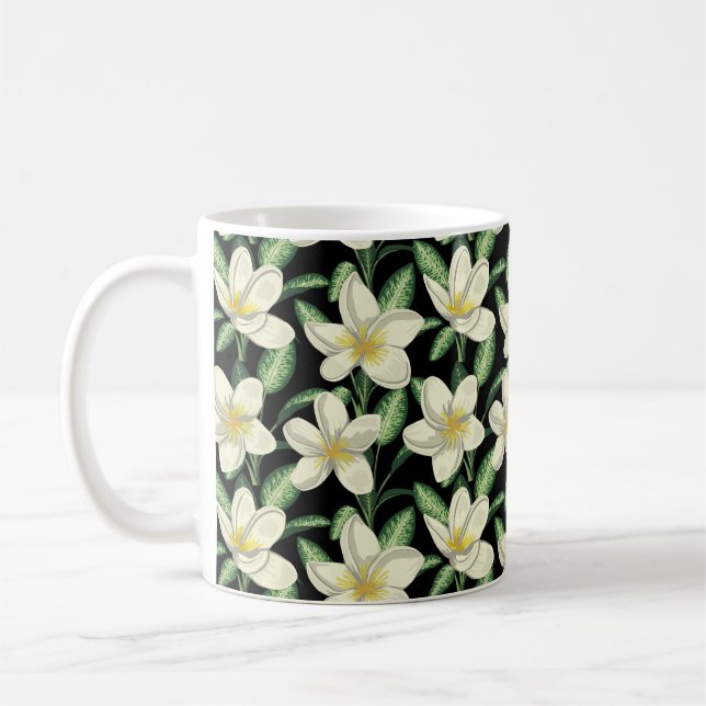 Tropical seamless pattern white flowers green leaf coffee mug (Left)