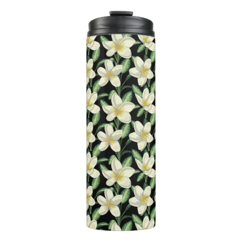Tropical seamless pattern white flowers green leaf thermal tumbler
