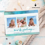 Tropical SEAson's Greetings Three Photos Holiday Card<br><div class="desc">This watercolor Christmas holiday greeting photo card with 3 pictures coordinates with your beach, cruise, sailing or tropical vacation photos or you're sending wishes from your coastal, tropical or beach home. The greeting SEAS AND GREETINGS is a play on SEASON'S GREETINGS and in a modern, handwritten brush script typography in...</div>