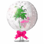 Tropical Snow globe Ornament<br><div class="desc">Our original tropical snow globe artwork, with a flamingo and palm tree inside a glass snow globe. Wonderful as an ornament for your Christmas tree this year, makes an outstanding gift too. Get it as a key chain, standing sculpture, pin, and magnet too, you chose how you want this great...</div>