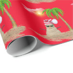 tropical snowman with palm tree wrapping paper<br><div class="desc">Sand snowman with red and white stocking cap and sunglasses.
Christmas lights on palm tree with bright sunshine through white fluffy clouds on red background.
Background color can be edited.</div>