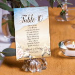 Tropical Sunset Beach Wedding Seating Chart Card<br><div class="desc">Picture this: a tropical beach at sunset, the sun cascading its golden hues across the sand and sea. The evening air is warmed by a light breeze while the waves of the ocean whisper a sweet serenade. Nearby, a clutch of chairs is arranged in a semi-circle, and you can just...</div>