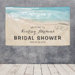 Tropical Vintage Beach Heart Shore Bridal Shower Banner<br><div class="desc">Beach destination bridal shower banner featuring a summer tropical beach island background, a vintage sandy beach with two hearts in the shoreline, your initials and a bridal party text template. Click on the “Customize it” button for further personalization of this template. You will be able to modify all text, including...</div>