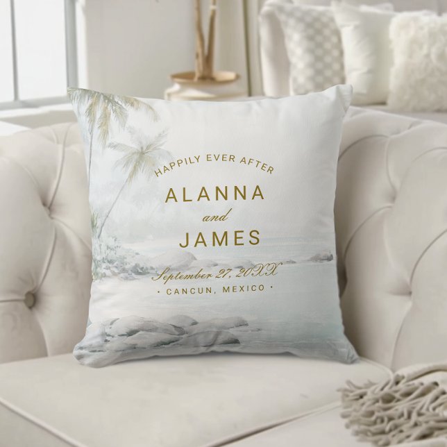 Tropical Watercolor Beach Wedding Keepsake Pillow  (Personalized beach wedding pillow with “Alanna and James” text on a cream tufted couch.)