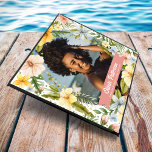 Tropical Watercolor Florals & Greenery Photo Graduation Cap Topper<br><div class="desc">Fancy a tropical summery vibe for your graduation! This graduates cap topper is designed with a photograph of the grad framed with a white oval overlay adorned by colorful tropical exotic flowers and botanical greenery. A pink scroll for you to add name,  place of study and class year.</div>