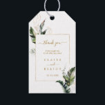 Tropical Watercolor Foliage Gold Wedding Thank You Gift Tags<br><div class="desc">This wedding thank you gift tag features watercolor green tropical foliage,  palm tree leaves,  banana leaves with a gold rectangle frame.  It's perfect for a beach or destination wedding. >>> Check out the entire collection >>> https://www.zazzle.com/collections/tropical_foliage_gold_collection-119316977990783186</div>
