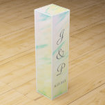 Tropical Watercolor Monogrammed Wedding Wine Box<br><div class="desc">Romantic splash of soft pink, green, yellow, blue tropical watercolor wash Wedding Favor Wine Boxes. All over print is lovely for your reception favor gifts for wine or champagne bottles tucked inside, or for anniversary or other special occasions. Personalize with the Bride and Grooms First Name Initials and Wedding Date...</div>