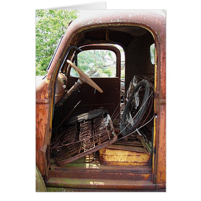 Truck Filled With Junk and Missing a Door Cards (Front)