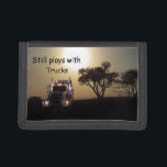 Trucker Trifold Wallet<br><div class="desc">Fun but true truck drivers wallet that shows just how big the big boy toys can get</div>