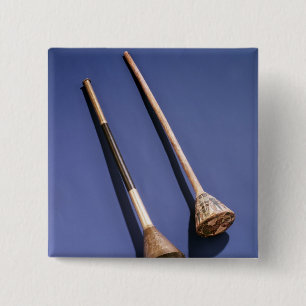 Trumpet and wooden stopper button