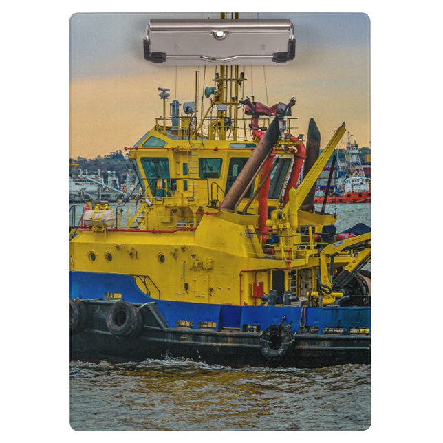 Tugboat sailing at river, montevideo, uruguay clipboard (Front)
