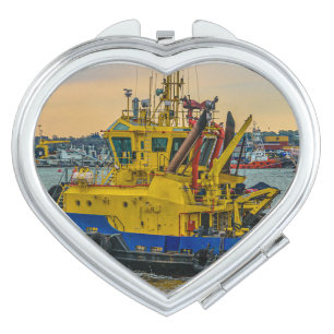 Tugboat sailing at river, montevideo, uruguay compact mirror