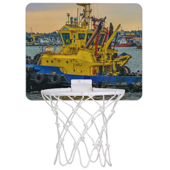 Tugboat sailing at river, montevideo, uruguay mini basketball hoop (Front)