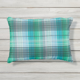 Turquoise and gray in a cage . outdoor pillow