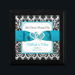 Turquoise, Black Damask Love Hearts Wedding Gift Box<br><div class="desc">This personalized and romantic jewelry box has a black and white damask pattern outer border with a turquoise ribbon and bow image with joined hearts images across the width of the trinket box. Above the ribbon, the words, "Two Hearts Became One" are printed in black script with the names of...</div>
