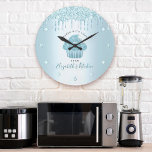 Turquoise Glitter Drips Cupcake Bakery Pastry Chef Large Clock<br><div class="desc">Make a stylish impression with this elegant, sophisticated, simple, and modern custom name wall clock. A sparkly, turquoise blue cupcake, handwritten script and glitter drips overlay a faux metallic turquoise aqua blue ombre background. Personalize with your full name, business, or other info. Your choice of a round or square clock...</div>