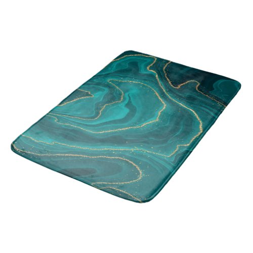 Turquoise liquid marble background with gold bath mat