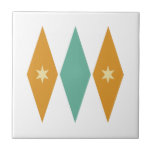 Turquoise Orange Diamonds Cream Stars Mid Century Ceramic Tile<br><div class="desc">This colorful mid century modern ceramic tile features turquoise blue and orange diamonds with cream colored stars. So fun to add to your tiling project!</div>
