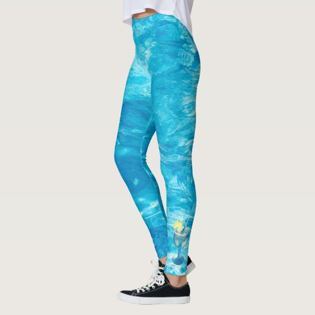 Turquoise pool water with cocktail leggings (Left)