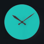 Turquoise Round Clock<br><div class="desc">Turquoise solid color Wall Clock by Gerson Ramos.</div>