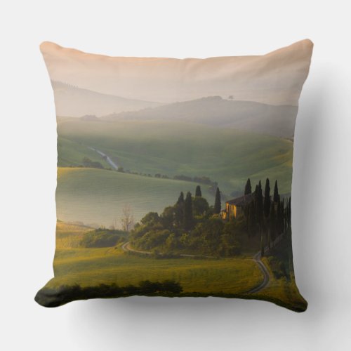 Tuscany hill landscape at sunrise throw pillow