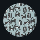 Tuxedo Black and White Cats Magnet<br><div class="desc">Cute black and white tuxedo cats going about their business. A fun pattern on a mid blue background.</div>
