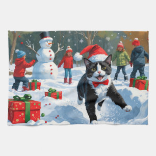 Tuxedo Cat Running in Snow with Christmas Hat Kitchen Towel