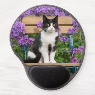 Tuxedo cat sitting on a garden chair with flowers gel mouse pad