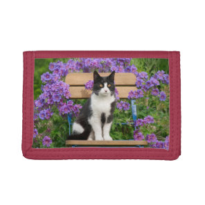 Tuxedo cat sitting on a garden chair with flowers tri-fold wallet